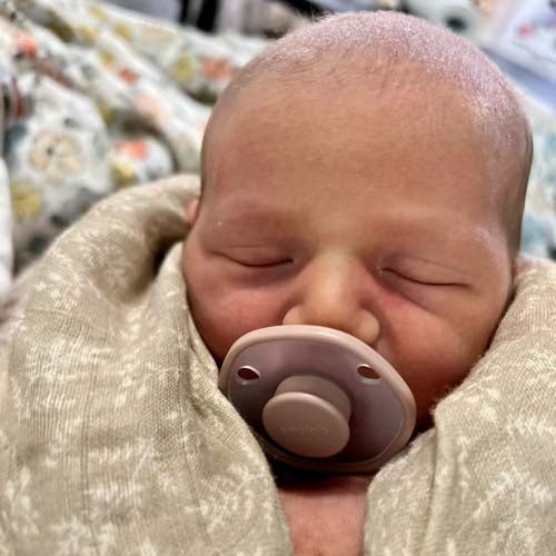 Sleeping Baby with Rose Emulait Pacifier
